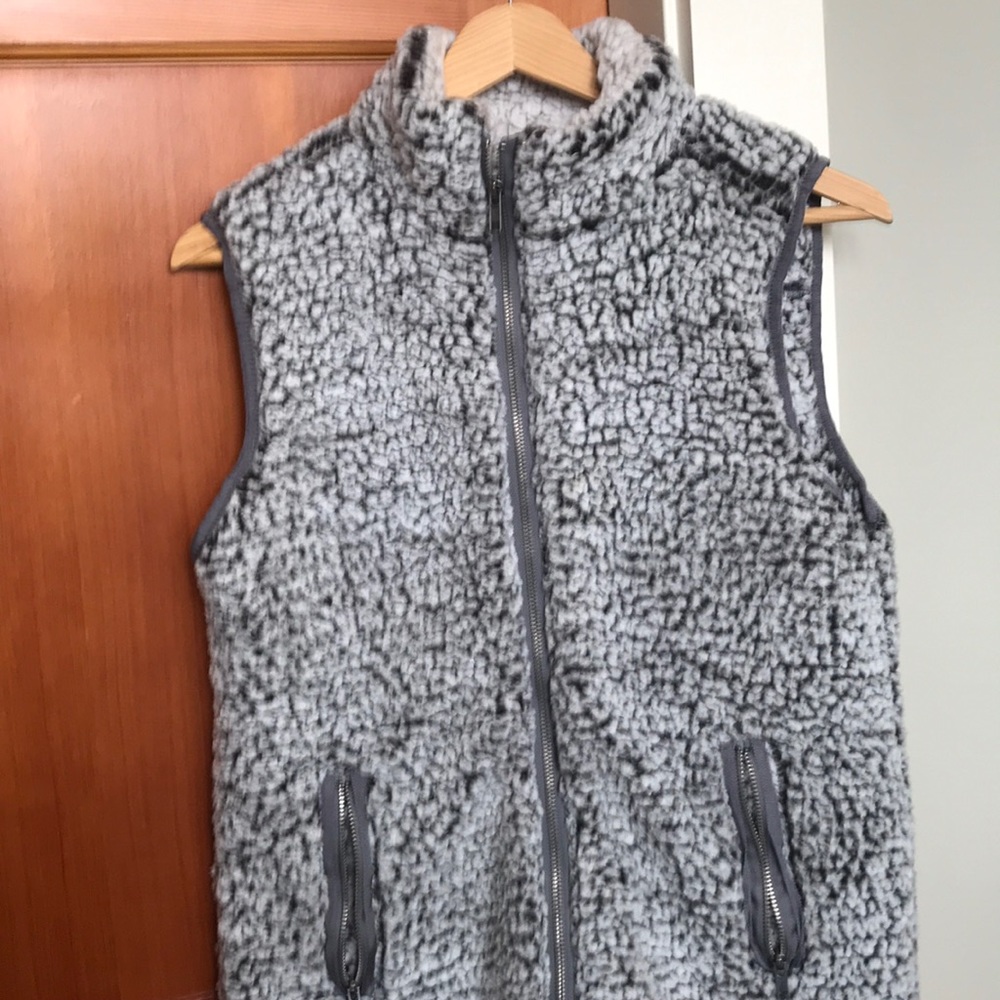 grey fuzzy vest